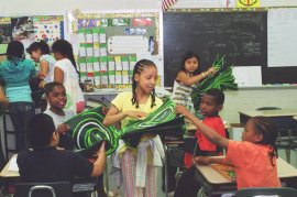 passing out reusable bags